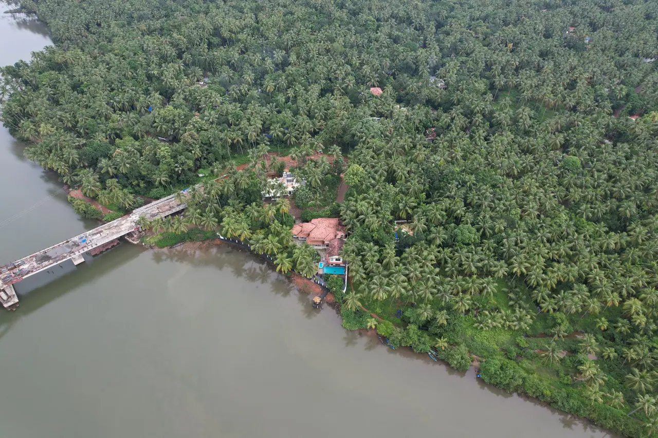 Aerial view of the BelleVue villa, pool and garden on the river