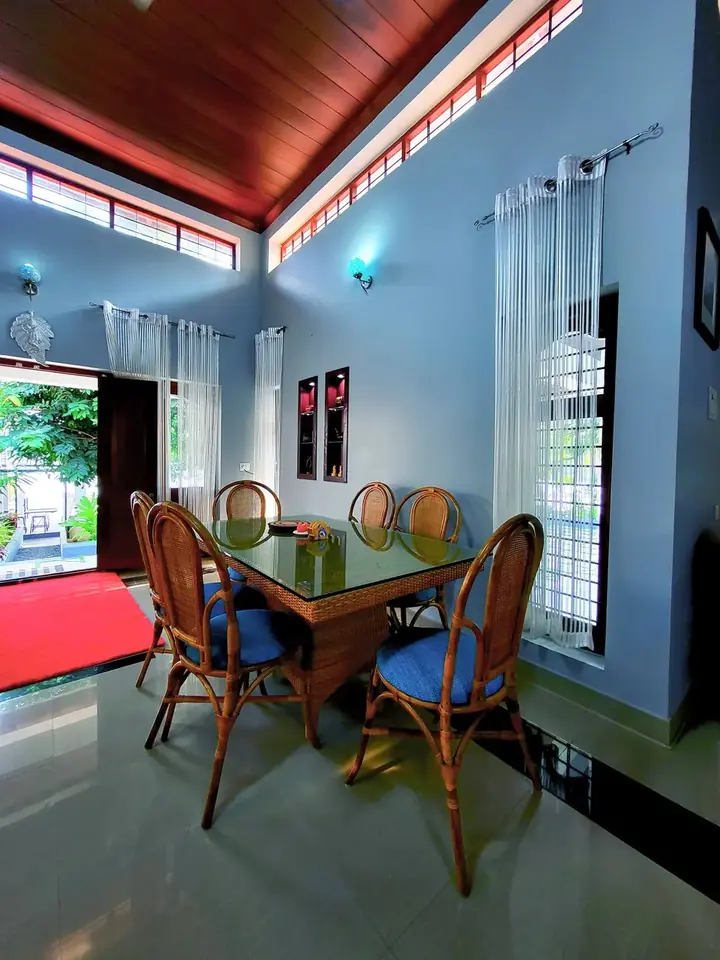 Dining area at BelleVue opening onto the garden