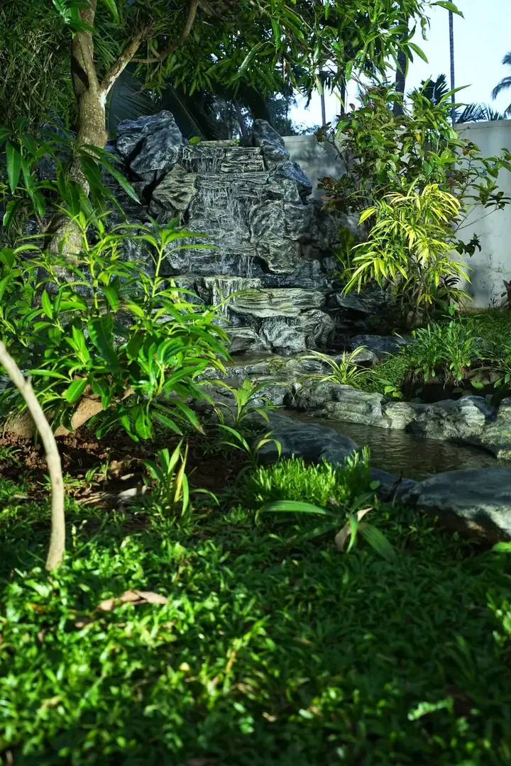 The rock water feature, BelleVue Riverside Villa, Kozhikode