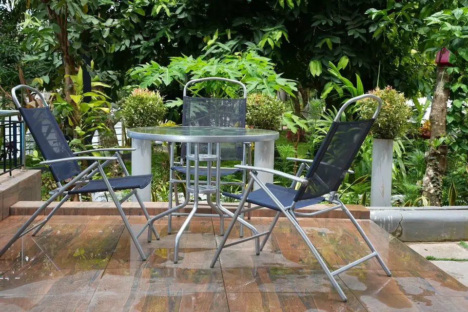 Seating under the trees, BelleVue Riverside Villa, Kozhikode