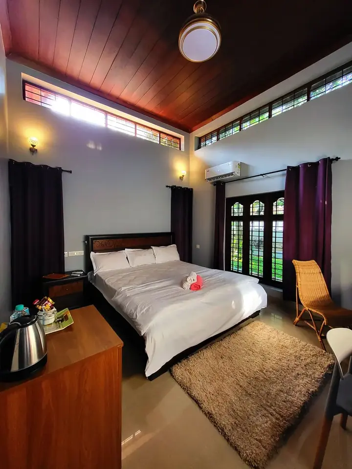 Evening in a king room, BelleVue Riverside Villa, Kozhikode