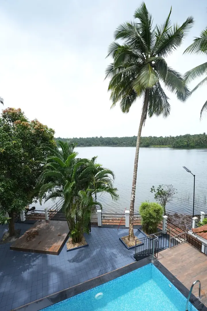 Pool and palms, BelleVue Riverside Villa, Kozhikode
