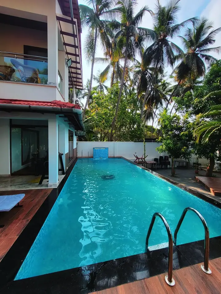 The pool beside the villa, BelleVue Riverside Villa, Kozhikode