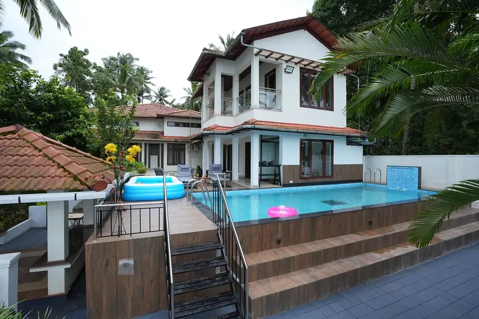 Steps down to the pool deck, BelleVue Riverside Villa, Kozhikode