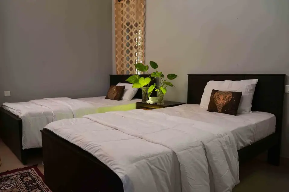 A twin room, BelleVue Riverside Villa, Kozhikode
