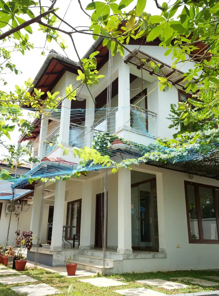 The two-storey wing from the garden, BelleVue Riverside Villa, Kozhikode