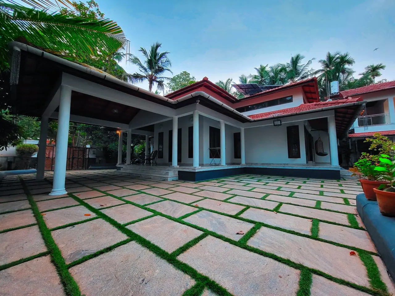Courtyard at sunrise, BelleVue Riverside Villa, Kozhikode